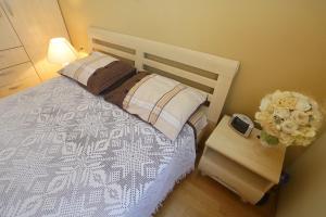 Ein Bett oder Betten in einem Zimmer der Unterkunft Sea View Apartments Pericic