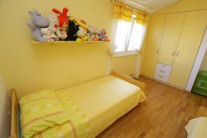 Ein Bett oder Betten in einem Zimmer der Unterkunft Sea View Apartments Pericic