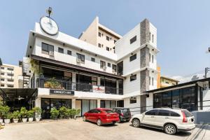 a building with cars parked in front of it at Diamond Hall Cebu - 102 in Cebu City