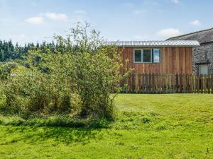 a house in a field with a bush at Partridge Hut-uk44850 in Walton