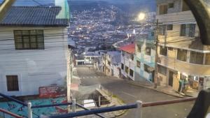 a view of a city street at night at Preciosa casa colonial in Quito