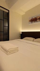 The Blocks Hostel Sukhumvit 10客房内的一张或多张床位