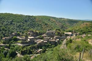 a small village on the side of a mountain at La Maison De Marthe in Malleval
