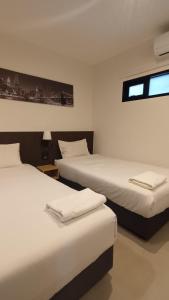 The Blocks Hostel Sukhumvit 10客房内的一张或多张床位