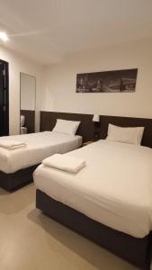 The Blocks Hostel Sukhumvit 10客房内的一张或多张床位