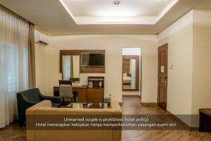 TV a/nebo společenská místnost v ubytování Hotel Alia Cikini
