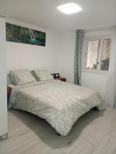 Postel nebo postele na pokoji v ubytování Chez Maria