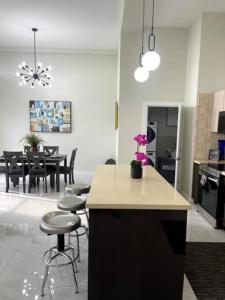 A restaurant or other place to eat at Luxury Ultra-Modern Apt in Kingston 6 Jamaica