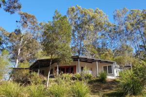 a house in the middle of the forest at Wolvi Wonderland - Eco Escape in Wolvi