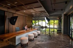 TV a/nebo společenská místnost v ubytování Nusa Dua Suites powered by Cocotel