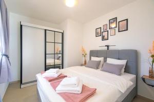 Posteľ alebo postele v izbe v ubytovaní Apartman Mares 2