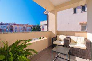 Balkón alebo terasa v ubytovaní Apartman Mares 2