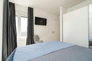 Ein Bett oder Betten in einem Zimmer der Unterkunft Villa Marita 2