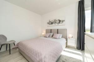 Ein Bett oder Betten in einem Zimmer der Unterkunft Villa Marita 2