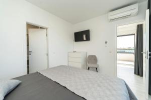Ein Bett oder Betten in einem Zimmer der Unterkunft Villa Marita 2