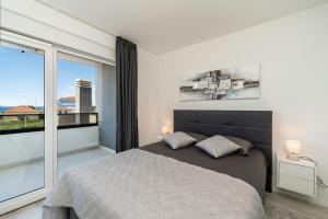 Ein Bett oder Betten in einem Zimmer der Unterkunft Villa Marita 2