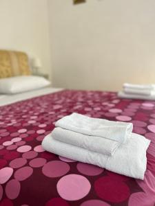 A bed or beds in a room at Yes Rome Holidays