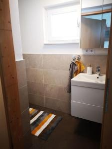 Ванна кімната в Apartment direkt am Weingut Garber