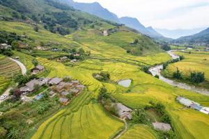 an aerial view of a village in the mountains at SaPa Farmer House in Sa Pa