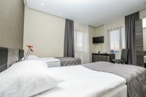 Postel nebo postele na pokoji v ubytování Bien hotel