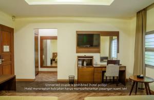 TV a/nebo společenská místnost v ubytování Hotel Alia Cikini