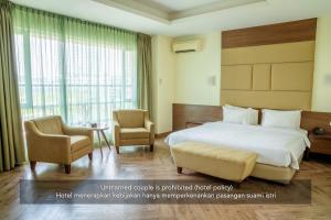 Postel nebo postele na pokoji v ubytování Hotel Alia Cikini
