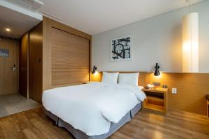 Postel nebo postele na pokoji v ubytování Mate Hotel Paju + 27 fotografií