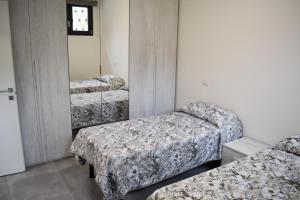 Cama ou camas em um quarto em Albergo il Torchio