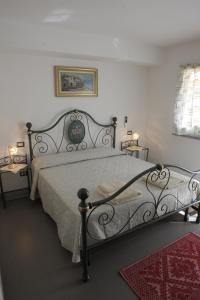 Кровать или кровати в номере B&B Terre del Sinis