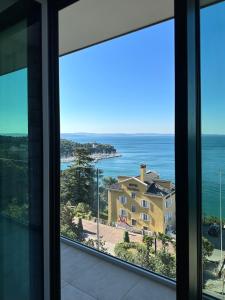 a view of the ocean from a house at Maximilian Suites in Trieste