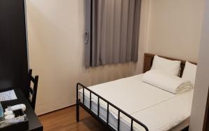 Voodi või voodid majutusasutuse Soosong Guesthouse toas