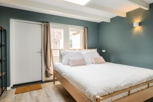 Postel nebo postele na pokoji v ubytování Studio Luxe 31 Zandvoort met gratis parkeerplaats