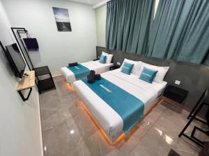 Postel nebo postele na pokoji v ubytování BEATRIX HOTEL