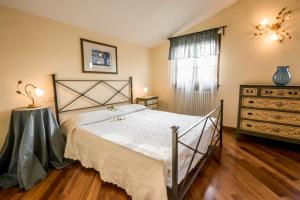 Posteľ alebo postele v izbe v ubytovaní B&B Maesta' Di Cudino + 37 fotografií