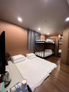 Voodi või voodid majutusasutuse Soosong Guesthouse toas