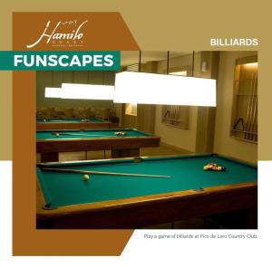 a row of pool tables in a room with billards at Pico De Loro 2BR Carola B Unit with Lagoon View in Nasugbu