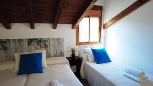 Postel nebo postele na pokoji v ubytování Villa Encanto