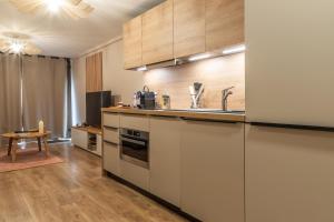 Virtuvė arba virtuvėlė apgyvendinimo įstaigoje Host Inn - Duplex Insolite & Chic - Ancienne librairie