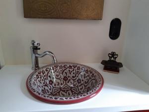 a sink on a bathroom counter with aacted at Zigappo Orientale in Lychen