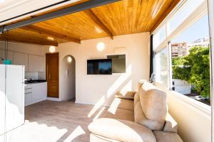 Et tv og/eller underholdning på Balcón al mar - A 50 metros de la playa