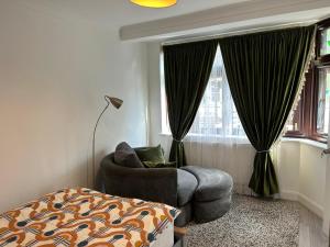 Ένα ή περισσότερα κρεβάτια σε δωμάτιο στο Easy Room in London