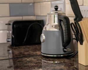 a coffee maker sitting on a counter in a kitchen at Leicester - Apartment - Sleeps 2 - 97WS in Leicester