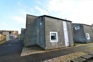 a building with a window on the side of it at Signature - Alder View in Cumbernauld