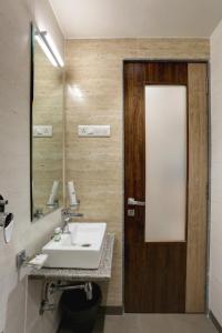 Koupelna v ubytování Hotel Ozone Inn Colaba