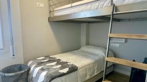Postel nebo postele na pokoji v ubytování Rocamaura IV 3-12