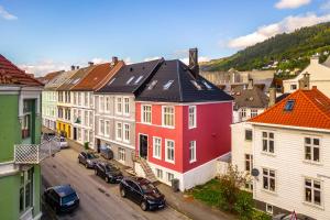 an aerial view of a town with houses and cars at Corner Apartments in Bergen