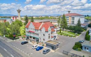 an overhead view of a building in a city at Pensiunea Diamant in Ghimbav