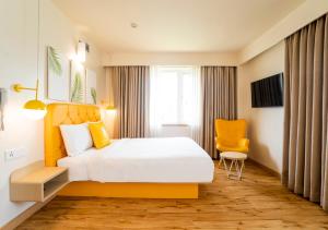 Bloom Hotel - Jammu客房内的一张或多张床位