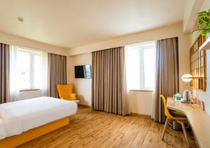 Bloom Hotel - Jammu客房内的一张或多张床位