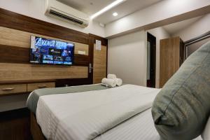 TV a/nebo společenská místnost v ubytování Hotel Ozone Inn Colaba